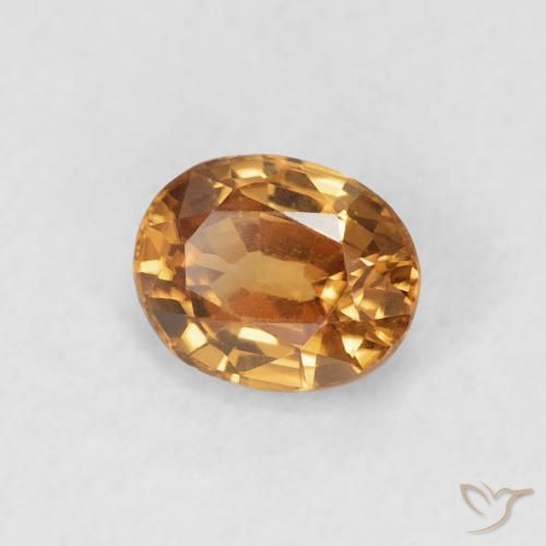 Zircon Orange brun naturelle ovale, 0.93 ct, VVS