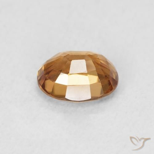 Zircon Orange brun naturelle ovale, 0.93 ct, VVS