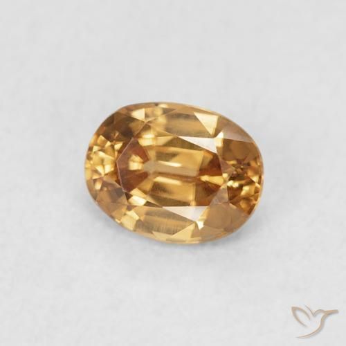 Zircon Pêche doré naturelle ovale, 0.60 ct, VVS