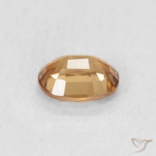 Zircon Pêche doré naturelle ovale, 0.60 ct, VVS