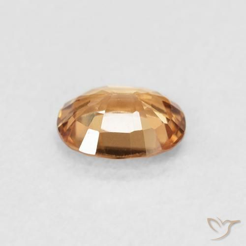 Zircon Orange brun naturelle ovale, 0.54 ct, VVS