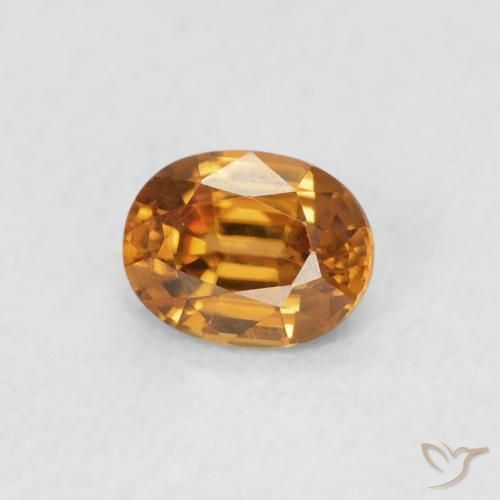 Zircon Orange foncé naturelle ovale, 0.61 ct, VVS