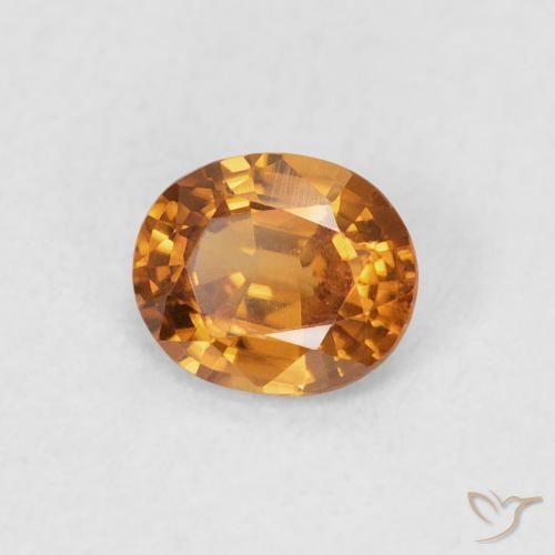 Zircon Orange brun naturelle ovale, 0.83 ct, VVS