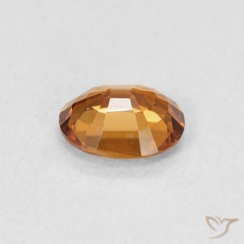 Zircon Orange brun naturelle ovale, 0.83 ct, VVS