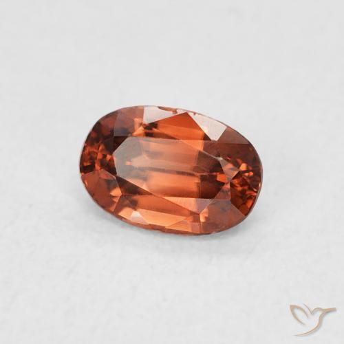 Zircon Orange rougeâtre naturelle ovale, 0.85 ct, VVS-VS