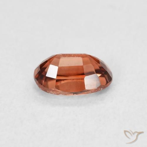 Zircon Orange rougeâtre naturelle ovale, 0.85 ct, VVS-VS