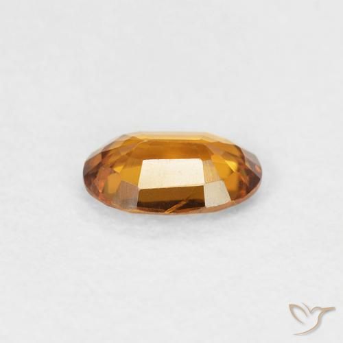Zircon Orange moyen naturelle ovale, 0.56 ct, VVS