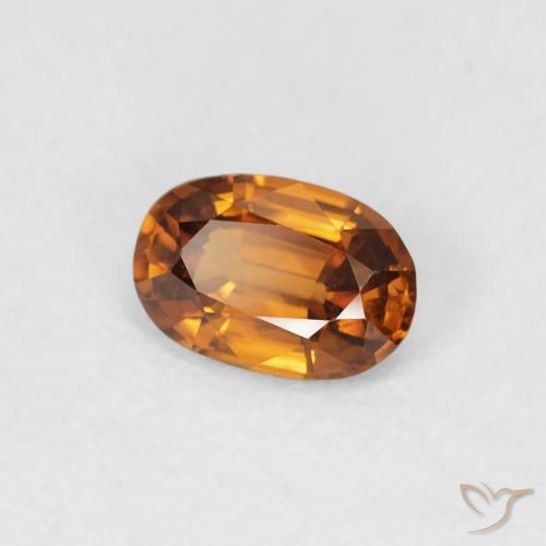 Zircon Orange brun naturelle ovale, 0.65 ct, VVS-VS