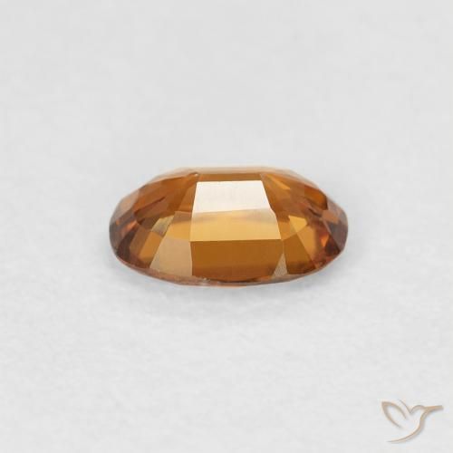 Zircon Orange brun naturelle ovale, 0.65 ct, VVS-VS