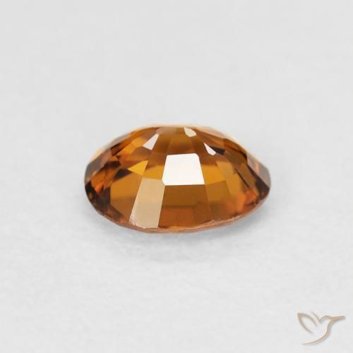 Zircon Orange terre naturelle ovale, 0.90 ct, VVS-VS