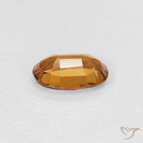 Zircon Orange brun naturelle ovale, 0.68 ct, VVS-VS