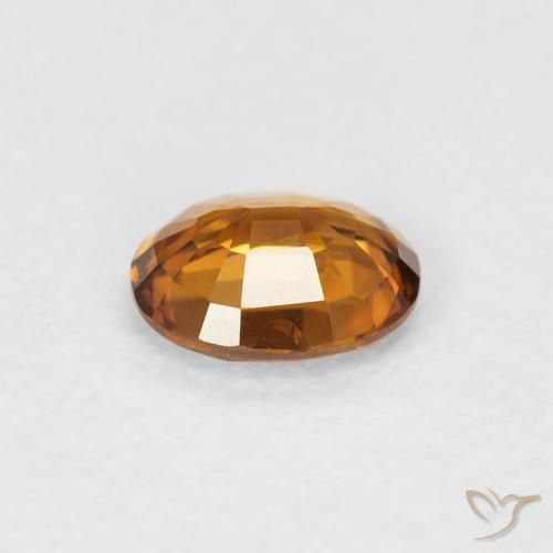 Zircon Orange brun naturelle ovale, 0.82 ct, VVS-VS
