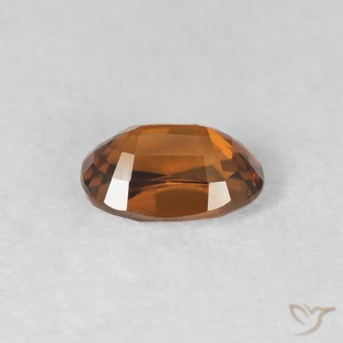 Zircon Orange brunâtre naturelle ovale, 0.86 ct, VVS