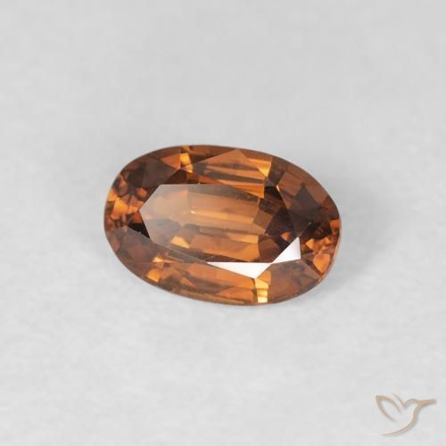 Zircon Orange brunâtre foncé naturelle ovale, 0.67 ct, VVS