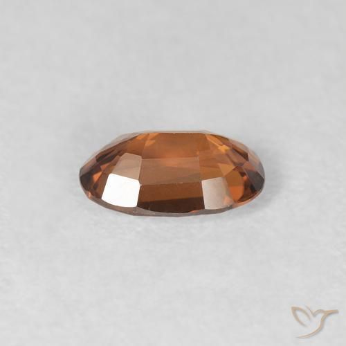 Zircon Orange brunâtre foncé naturelle ovale, 0.67 ct, VVS