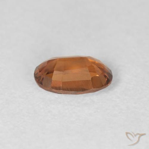 Zircon Orange terre naturelle ovale, 0.69 ct, VVS