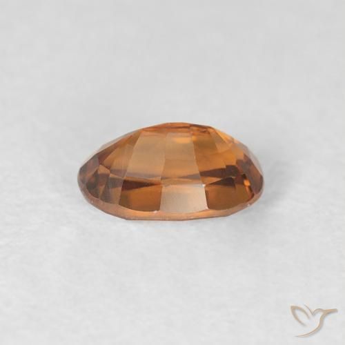 Zircon Orange foncé naturelle ovale, 0.84 ct, VVS-VS