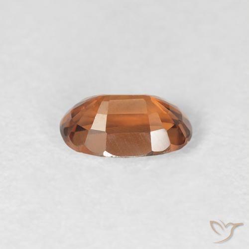 Zircon Orange foncé naturelle ovale, 0.69 ct, VVS