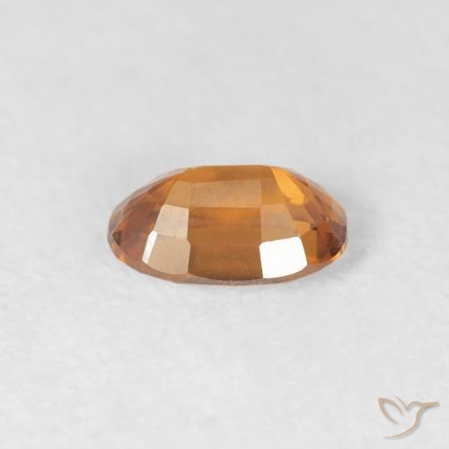 Zircon Orange foncé naturelle ovale, 0.75 ct, VVS