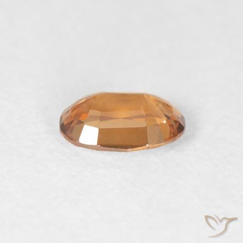 Zircon Orange moyen naturelle ovale, 0.64 ct, VVS