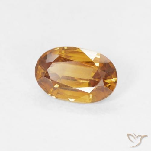 Zircon Orange moyen naturelle ovale, 0.70 ct, VVS