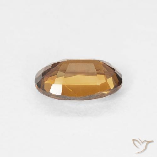 Zircon Medium Dark-Orange naturelle ovale, 0.75 ct, VVS