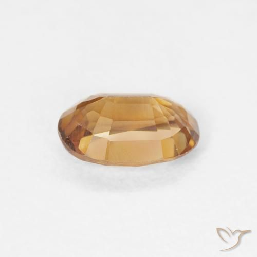 Zircon Orange moyen naturelle ovale, 0.72 ct, VVS