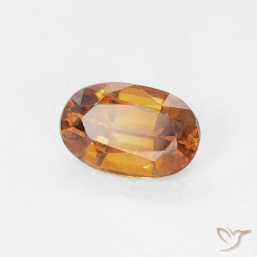 Zircon Orange moyen naturelle ovale, 0.73 ct, VVS