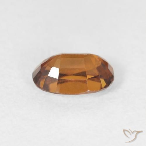 Zircon Orange brunâtre naturelle ovale, 0.81 ct, VVS
