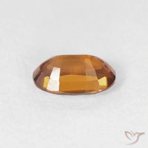 Zircon Orange terre naturelle ovale, 0.76 ct, VVS
