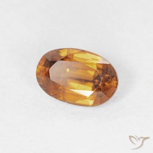 Zircon Orange brun naturelle ovale, 0.69 ct, VVS