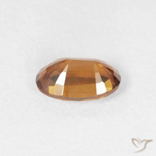 Zircon Orange brun naturelle ovale, 0.69 ct, VVS
