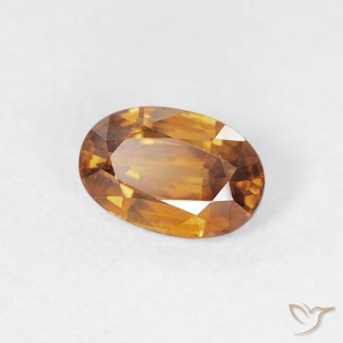 Zircon Orange brun naturelle ovale, 0.71 ct, VVS