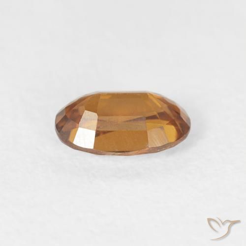 Zircon Orange brun naturelle ovale, 0.71 ct, VVS