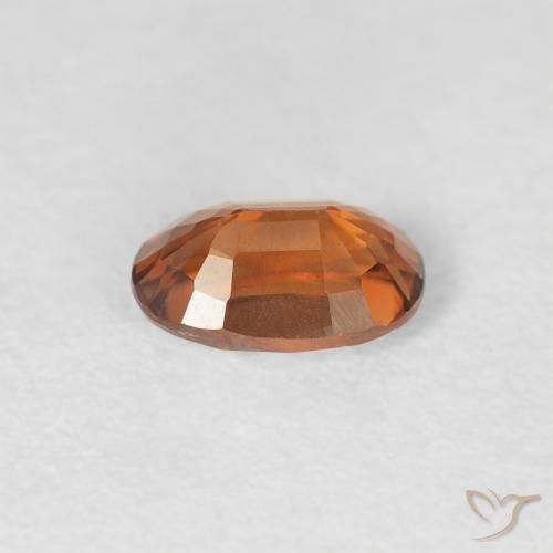 Zircon Medium Dark-Orange naturelle ovale, 0.76 ct, VVS