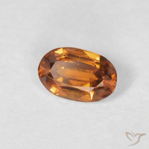 Zircon Medium Dark-Orange naturelle ovale, 0.71 ct, VVS
