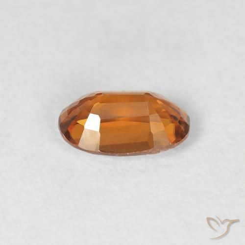 Zircon Medium Dark-Orange naturelle ovale, 0.71 ct, VVS