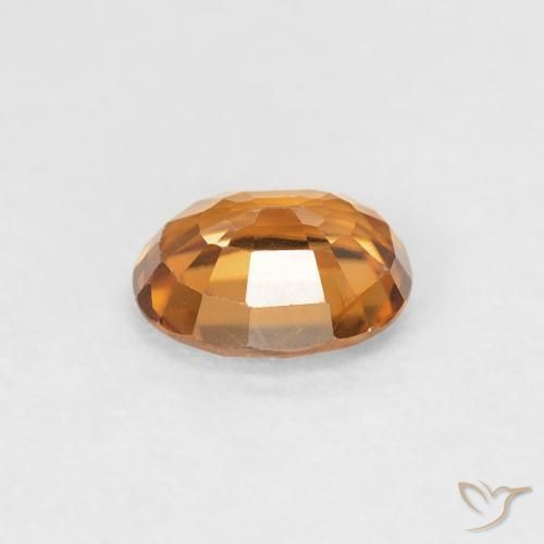 Zircon Orange foncé naturelle ovale, 0.86 ct, VVS-VS