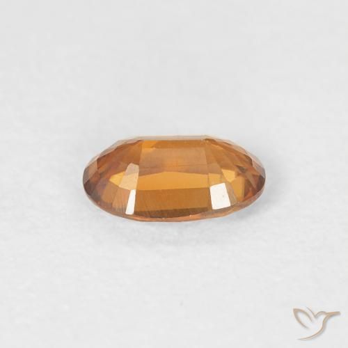 Zircon Orange moyen naturelle ovale, 0.63 ct, VVS-VS