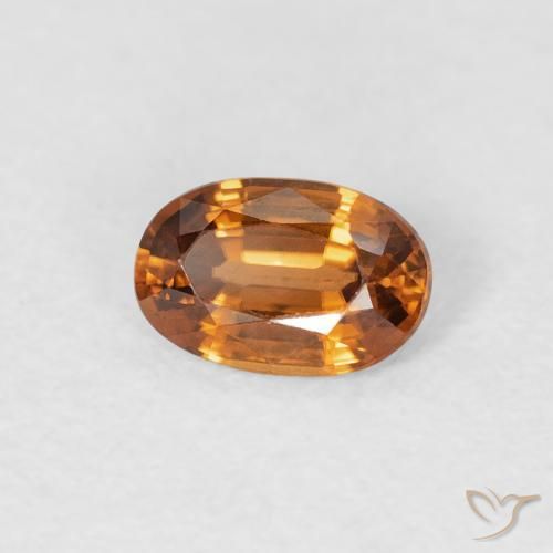 Zircon Orange terre naturelle ovale, 0.68 ct, VVS