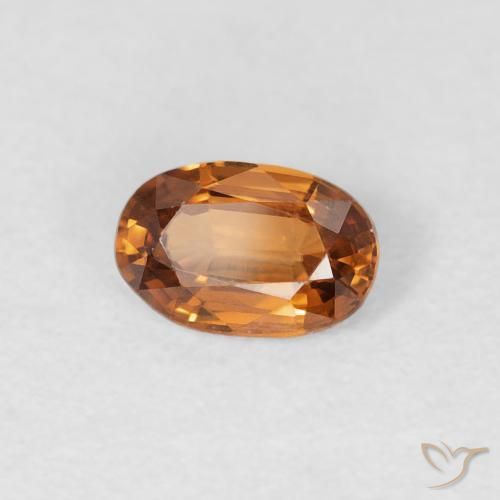 Zircon Orange brunâtre naturelle ovale, 0.66 ct, VVS