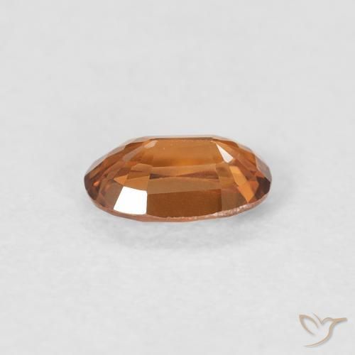 Zircon Orange brunâtre naturelle ovale, 0.66 ct, VVS