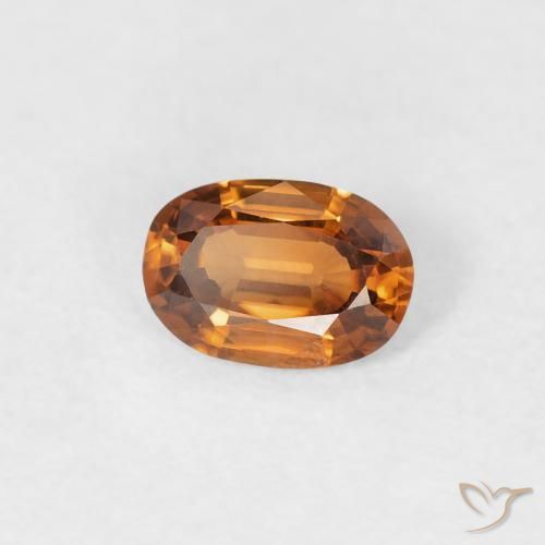 Zircon Orange brunâtre naturelle ovale, 0.55 ct, VVS
