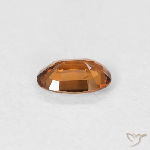 Zircon Orange brunâtre naturelle ovale, 0.55 ct, VVS