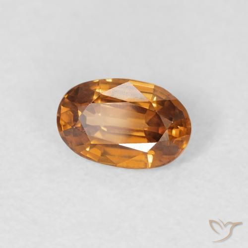 Zircon Orange terre naturelle ovale, 0.73 ct, VVS