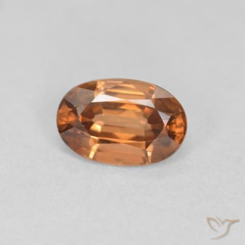 Zircon Orange foncé naturelle ovale, 0.69 ct, VVS-VS