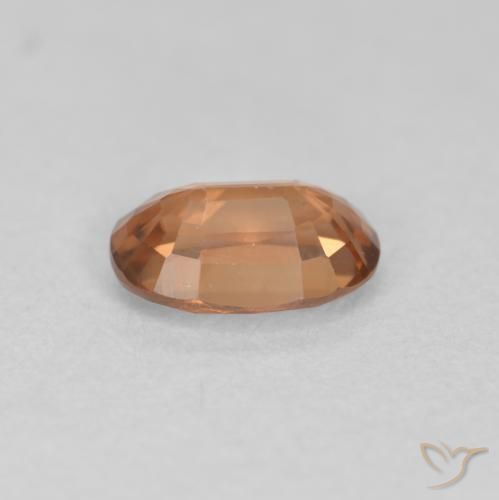 Zircon Orange foncé naturelle ovale, 0.69 ct, VVS-VS