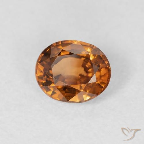Zircon Orange foncé naturelle ovale, 0.94 ct, VVS
