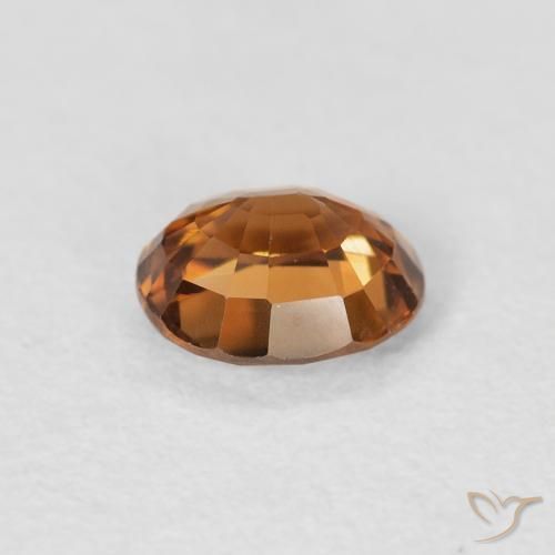 Zircon Orange foncé naturelle ovale, 0.94 ct, VVS