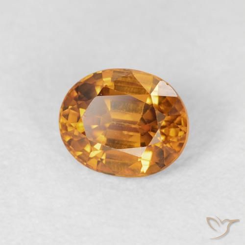 Zircon Orange foncé naturelle ovale, 1.07 ct, VS